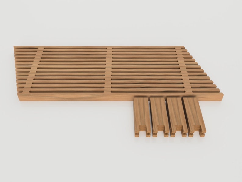 May include: A wooden slatted platform with a slightly angled design. The platform is made of natural wood and has a light brown color. The platform is disassembled and the slats are stacked on top of each other.