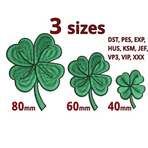 Puede incluir: Tres tréboles de cuatro hojas bordados en verde de diferentes tamaños: 80 mm, 60 mm y 40 mm. La imagen incluye el texto "3 tamaños" y abreviaturas de formato de archivo. Los tréboles tienen costuras detalladas.