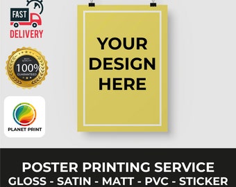 May include: A yellow poster with the text "YOUR DESIGN HERE" printed on it. The poster is hanging from two clips. The text "POSTER PRINTING SERVICE GLOSS - SATIN - MATT - PVC - STICKER" is printed below the poster.