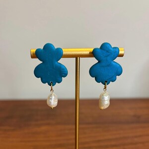 Turquoise and pearl clay earrings