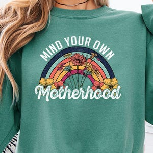 Comfort Colors Mind Your Own Motherhood shirt, Motherhood shirt, Boho Sweatshirt, Mothers Day Shirt, Mom Retro Hoodie, Floral Mom Shirt