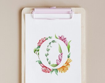 May include: A white clipboard with a pink clip holds a white sheet of paper with a watercolour painting of a floral wreath. The wreath is made of pink, yellow, and green flowers and leaves.
