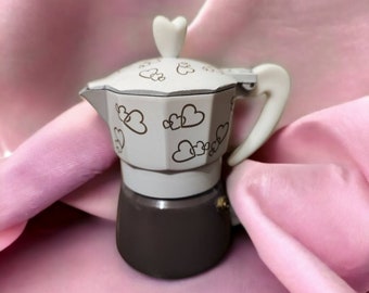 Italian moka coffee maker with heart decoration