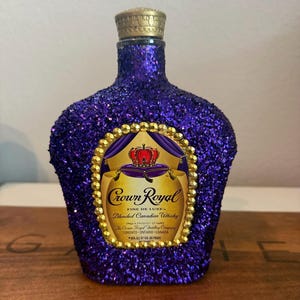 Crown Royal: Limited Edition Glitter Custom Bottle with Rhinestone Accents - Elevate Your Bar Cart with Regal Elegance and Opulent Glamour!