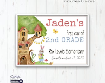 May include: A framed watercolour print for the first day of 2nd grade. The design features a treehouse school with a rabbit student, the name "Jaden's", and the date September 7, 2023. The print includes 6 sizes.