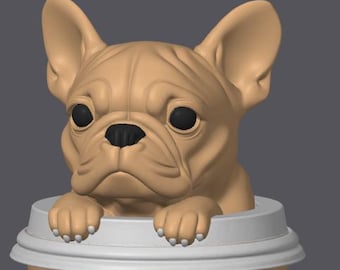May include: A tan-colored French Bulldog figurine peeks out of a brown paper coffee cup with a white lid. The dog has black eyes and is resting its paws on the cup's rim. The cup is a standard size.