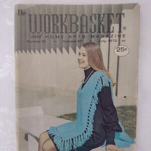 May include: The Workbasket and Home Arts Magazine, July 1972, Volume 37, Number 10. A woman wearing a blue crocheted shawl with fringe sits on a bench. The magazine cover features a price of 25 cents.