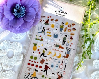 Puede incluir: Una hoja de pegatinas coloridas con ilustraciones de personas haciendo ejercicio, comiendo alimentos saludables y participando en actividades relacionadas con la dieta. Las pegatinas incluyen frases como "Yummy Yummy", "Diet Start", "Banana Diet", "Drink Up" y "Fresh Day".