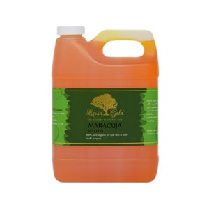 May include: A large, clear plastic bottle filled with a bright orange liquid. The bottle has a green label with the text "Liquid Gold" and "Maracuja Seed Oil". The label also states that the oil is 100% pure organic and is for hair, skin, and body.