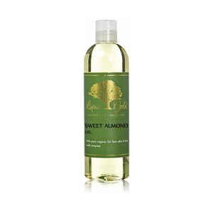 Puede incluir: Una botella de vidrio transparente de aceite de almendras dulces Liquid Gold. La botella tiene una etiqueta dorada con un &aacute;rbol verde y el texto "Liquid Gold The Academy of Organic Oils Sweet Almond Oil 100% pure organic for hair skin & body multi purpose".