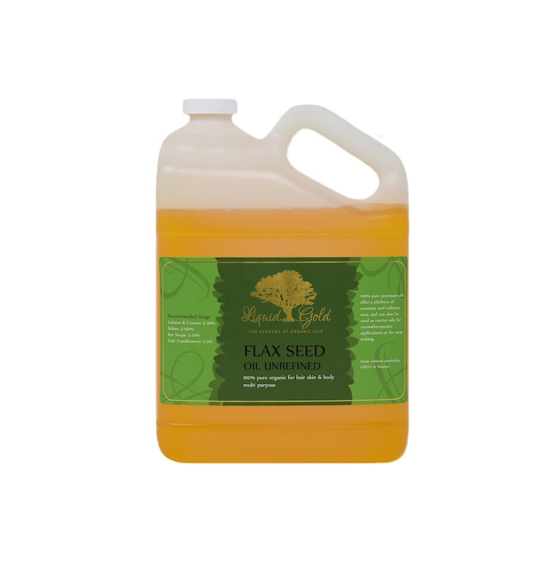 May include: A gallon jug of Liquid Gold Flax Seed Oil Unrefined. The label is green with a gold tree and the words "Liquid Gold" and "The Academy of Organic Oils". The label also says "100% pure organic for hair skin & body multi purpose".