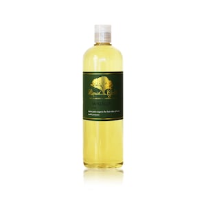 Pode incluir: Uma garrafa de vidro transparente com uma tampa dourada cheia de l&iacute;quido amarelo. A garrafa tem um r&oacute;tulo verde com letras douradas que dizem "Liquid Gold The Academy of Organics Walnut Oil 100% pure organic for hair skin & body multi purpose".