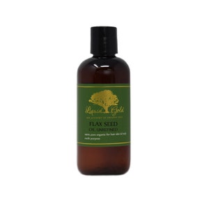May include: A brown bottle with a green label that says "Liquid Gold The Academy of Organic Oils Flax Seed Oil Unrefined 100% pure organic for hair skin & body multi purpose"