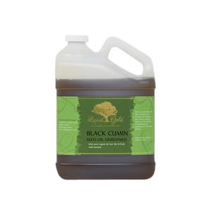 May include: A gallon jug of Liquid Gold Black Cumin Seed Oil Unrefined. The label is green and gold with a tree logo and the text "Liquid Gold The Alchemy of Organic Oils".