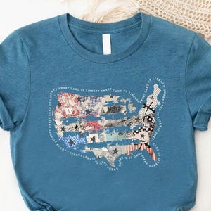 a t - shirt with a map of the united states on it