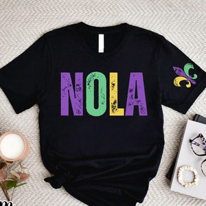 Nola T-shirt, Fleur de Lis Shirt, Nola Shirt With Fleur de Lis on Sleeve, Cute Mardi Gras Shirt, New Orleans Festival Gift,Nola Squad Shirts