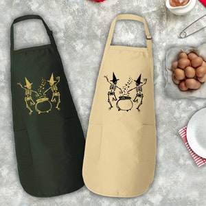 a pair of aprons sitting on top of a table
