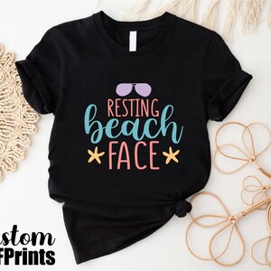 a t - shirt that says resting beach face