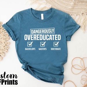 a t - shirt that says dangerously overed and has instructions on it