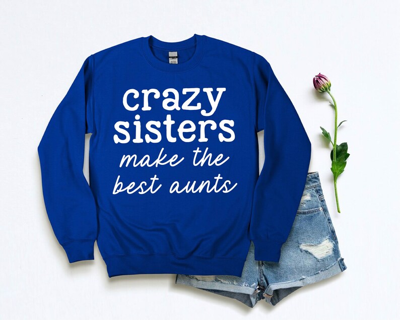 a blue sweatshirt that says crazy sisters make the best pants