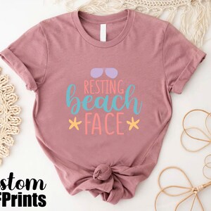 a t - shirt with the words resting beach face on it