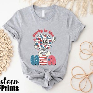 a t - shirt with a cartoon character on it
