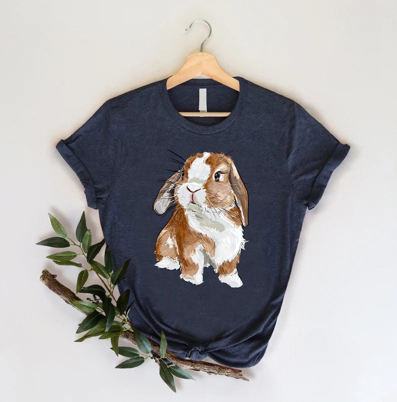 a t - shirt with a picture of a rabbit on it