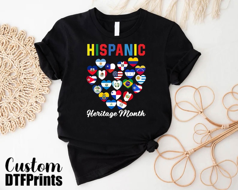 a black t - shirt with the words hispanic heritage month on it
