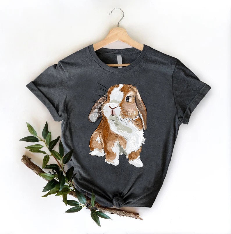 a t - shirt with a picture of a rabbit on it