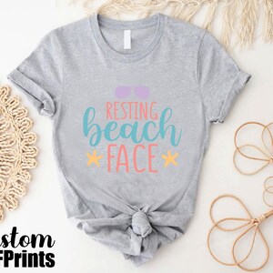 a t - shirt with the words resting beach face on it