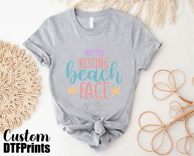a t - shirt with the words resting beach face on it