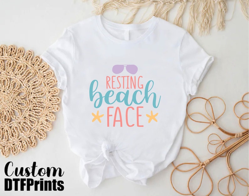 a white shirt with the words resting beach face on it