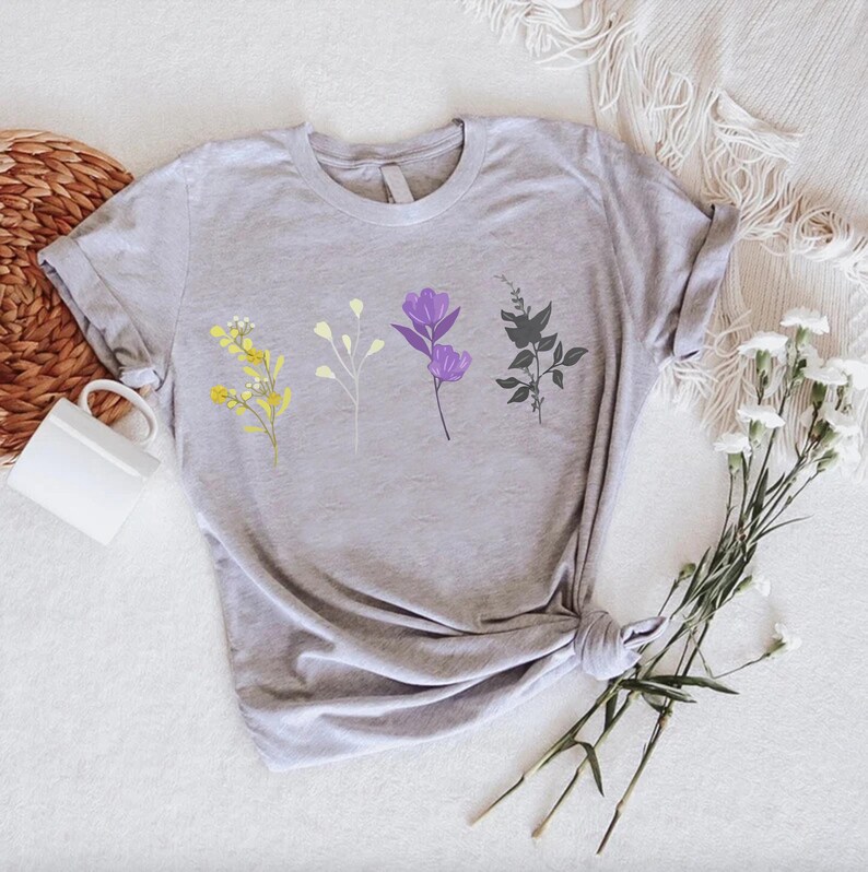 a t - shirt that has flowers on it