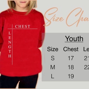 a woman wearing a red shirt with a height chart on it