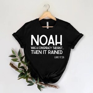 a t - shirt that says noah was a cosbyist racist then it rained