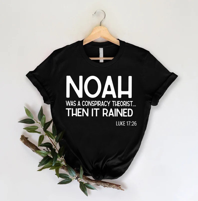 a t - shirt that says noah was a cosbyist racist then it rained