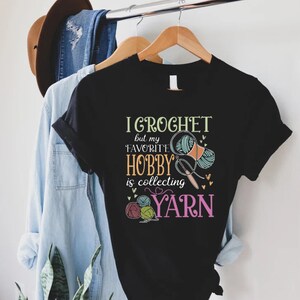 a t - shirt that says i crochet is a hobby is collecting yarn