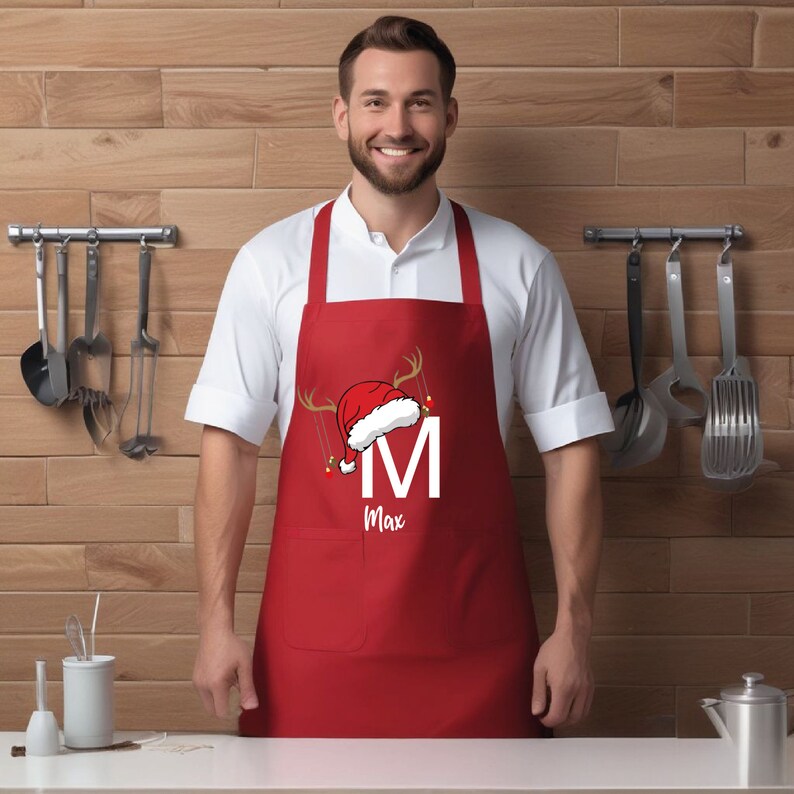 a man wearing an apron and a santa hat