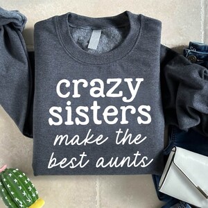 a shirt that says crazy sisters make the best pants