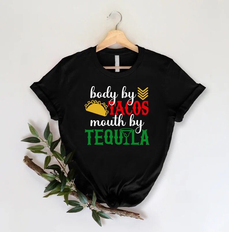 a black shirt that says body by tacos made by tequila