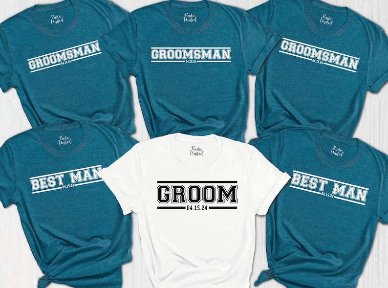 May include: Five teal blue t-shirts with white text that reads "Best Man" and "Groomsman" and one white t-shirt with black text that reads "Groom". The date "04.15.24" is printed on each shirt.