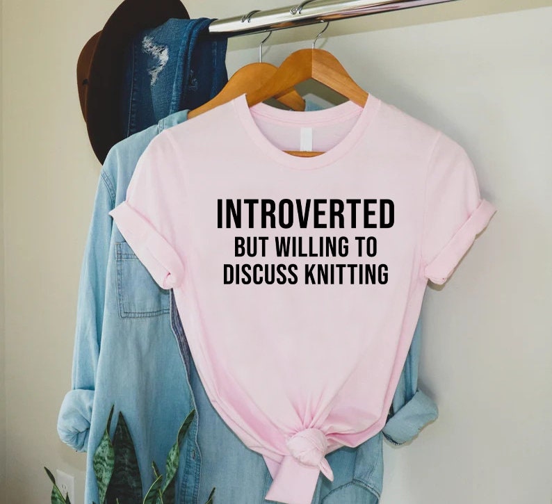 a pink t - shirt that says,'i'm interested, but will