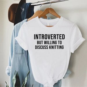 a white t - shirt that says, i'm interested but i'm