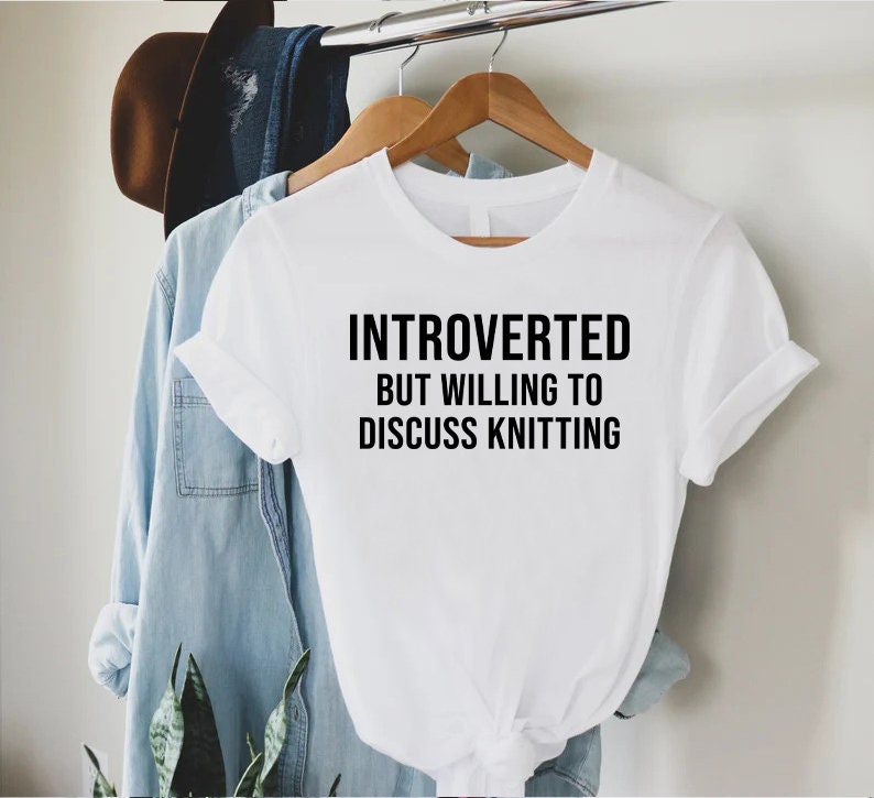 a white t - shirt that says, i'm interested but i'm