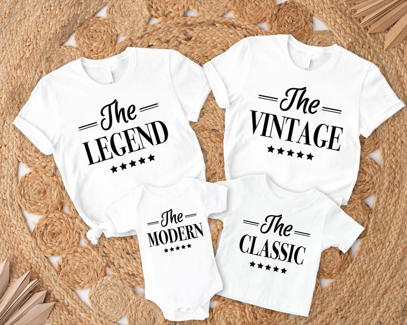 May include: Four white t-shirts with black text. The shirts say "The Legend", "The Vintage", "The Modern", and "The Classic".
