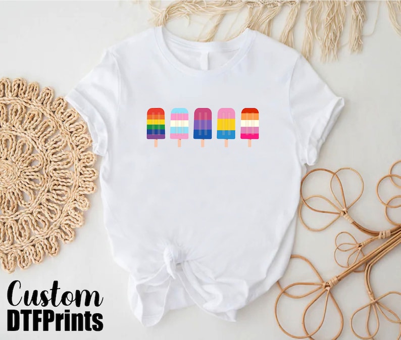 a white shirt with popsicles on it