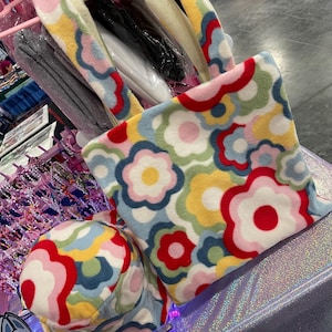 Sombrero tipo pescador/bolso de mano con estampado floral