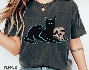 Camiseta con calavera de gato, camiseta con esqueleto y gato, color cómodo, ropa de arte vintage, estética de moda, ropa de bruja para mujer, camiseta de esqueleto
