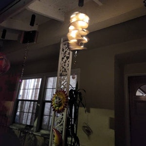 Lighted wind spinner as porch light