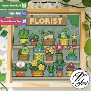 May include: A cross-stitch pattern featuring a flower shop with a sign that reads "FLORIST". The shop is filled with various potted plants and flowers, including a sleeping Eevee and a Squirtle.
